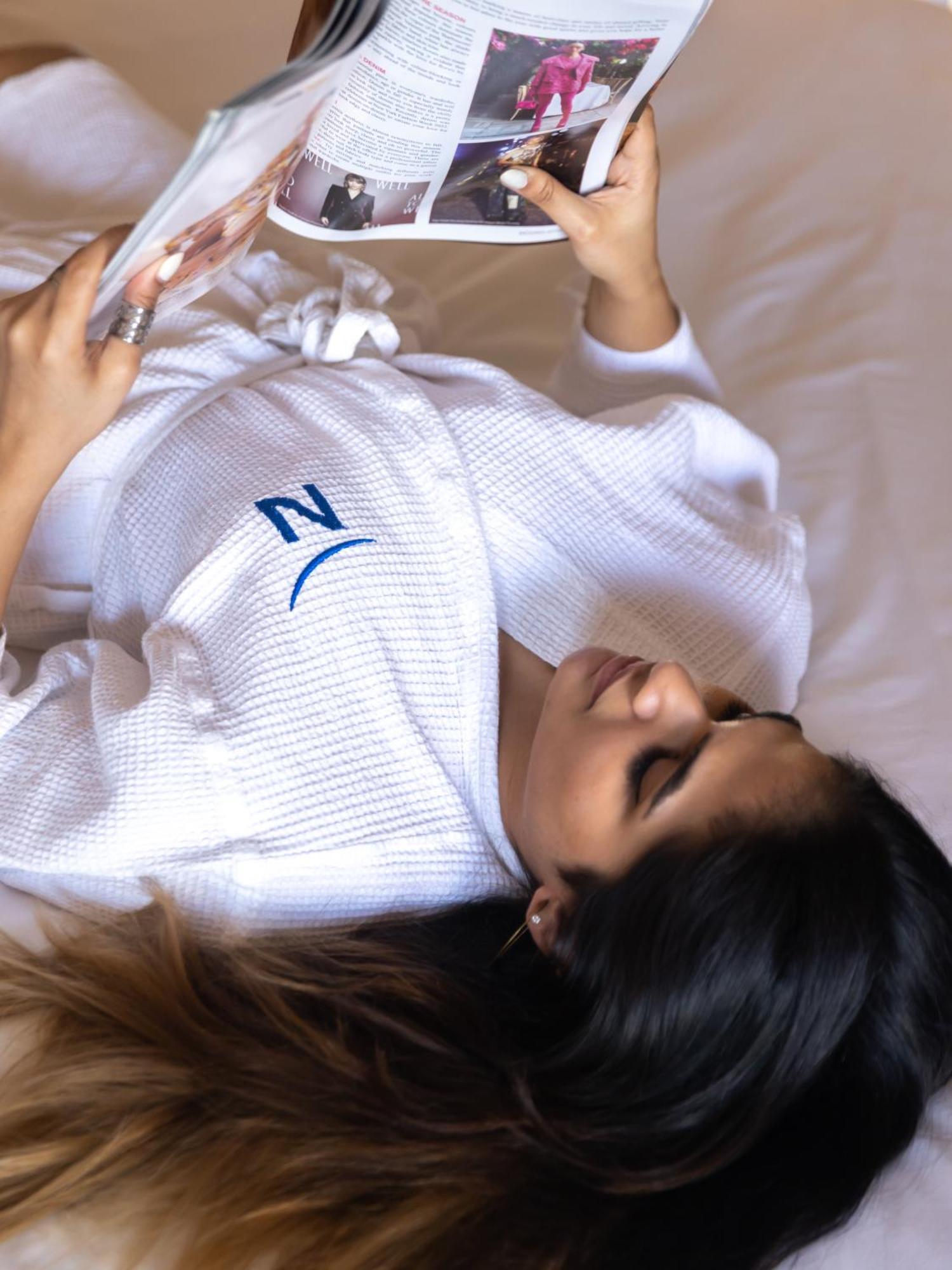 Novotel Goa Candolim Exterior photo A woman lying on her back
